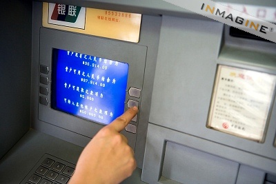 57 Years Old Chinese woman hailed hero after confronting cash machine robber