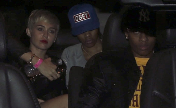 Miley Cyrus in night club