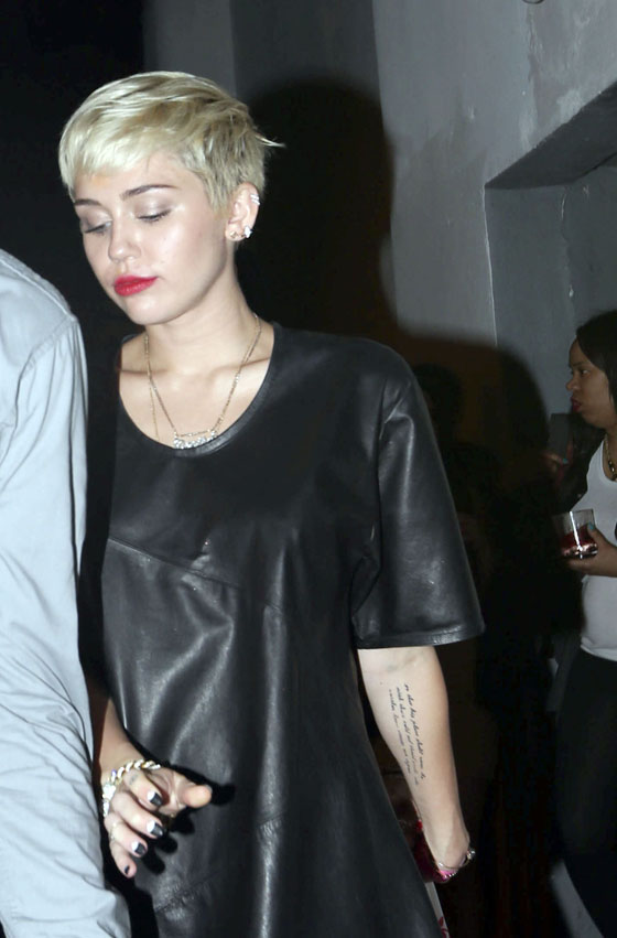 Exclusive... Underage Miley Cyrus Sneaks Out of the Club in Miami