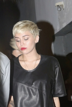 Miley Cyrus in night club